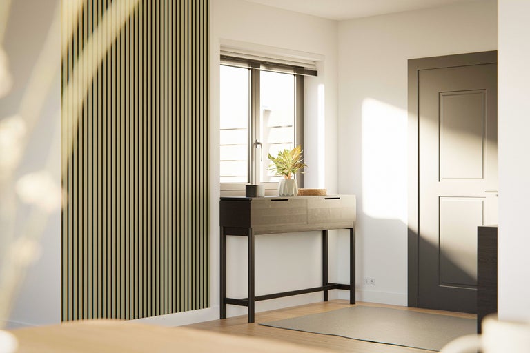 Ljus entré med väggpaneler, konsol och dörr