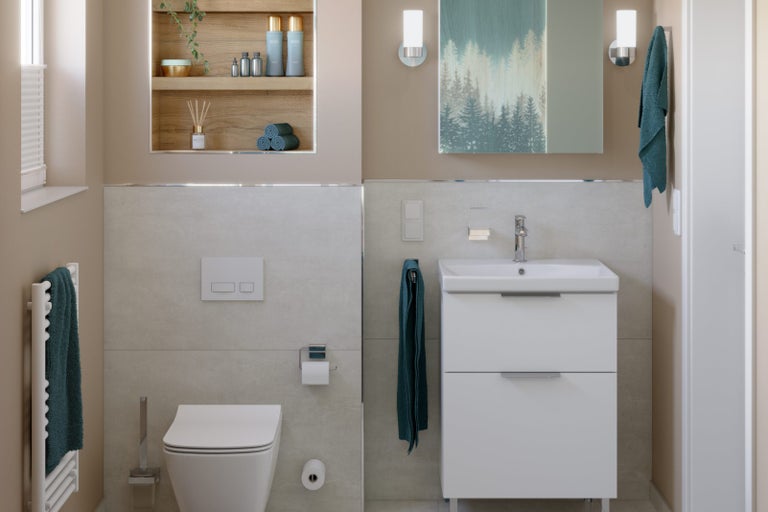 Badrum med toalett, tvättställsskåp och vägghylla