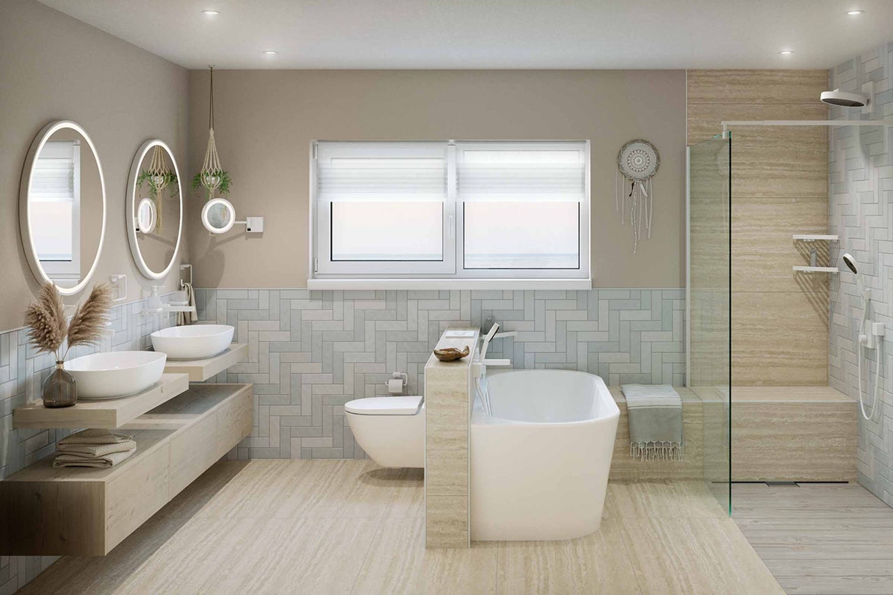 Ljust badrum med dubbla handfat, fristående badkar och duschkabin.