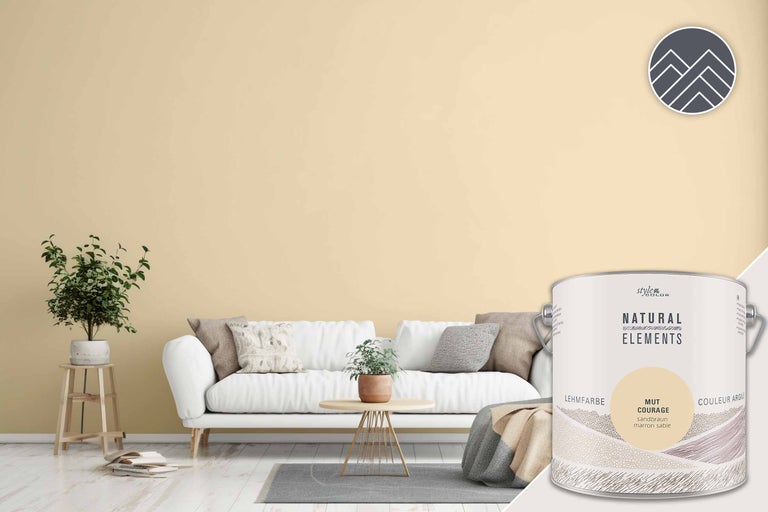 Vardagsrum med lerfärg i sandbrunt och färgburk