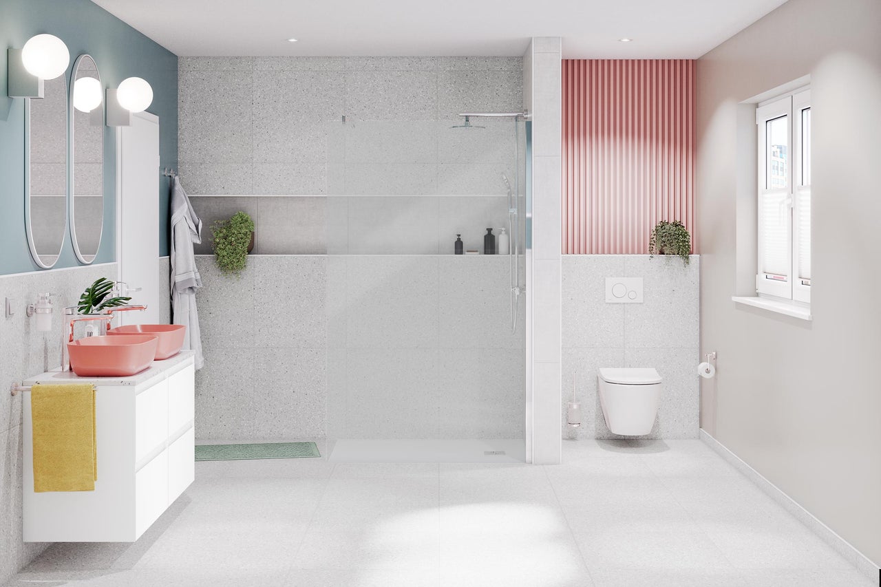 Ljust badrum med dusch, tvättställ med dubbla handfat och toalett