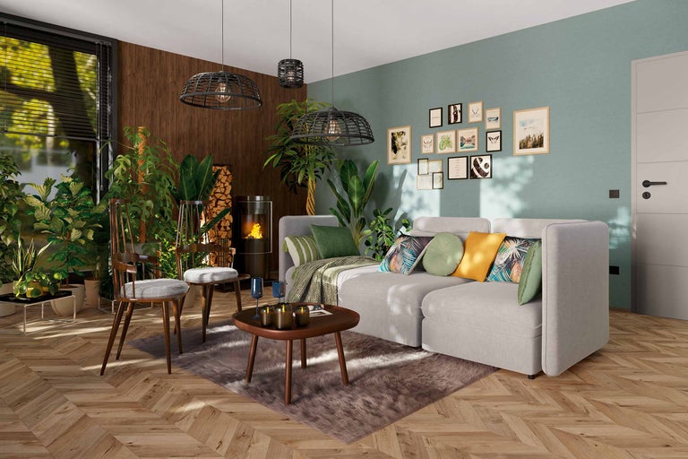 Vardagsrum med soffa, soffbord, kamin och dekorationer för en mysig atmosfär