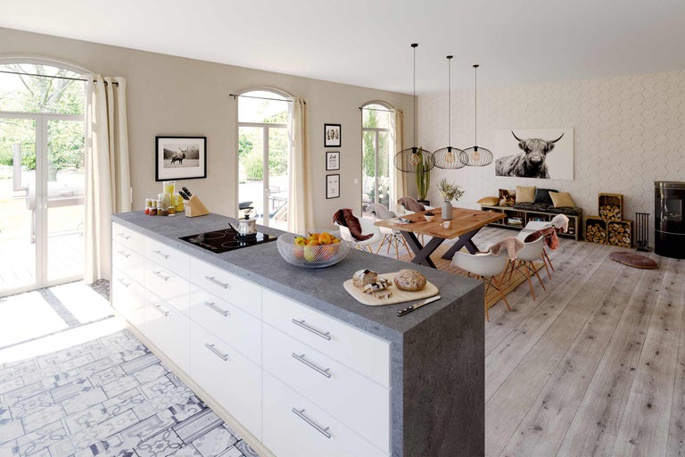 Ljust vardagsrum med köksö, matbord och dekorationer i modern stil