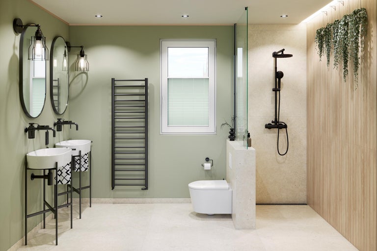 Badrum med dubbla handfat, element, toalett och dusch