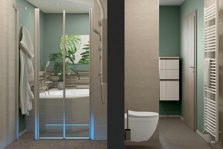 Modernt badrum med dusch, toalett, tvättställsskåp och handdukstork.