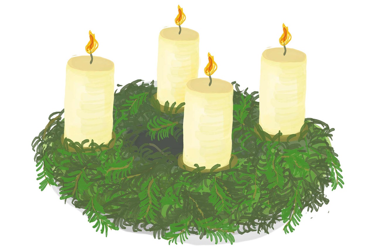 Adventskrans med fyra brinnande ljus