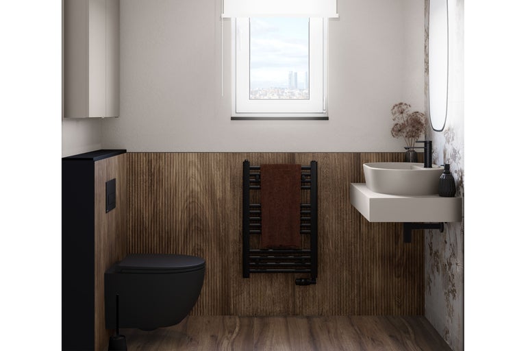 Modernt badrum med toalett, handfat, radiator och träpanel