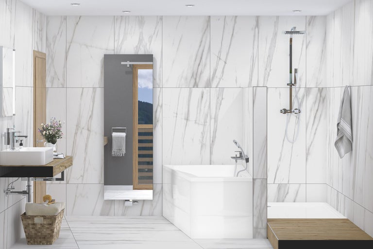 Modernt badrum med handfat, badkar och marmorplattor