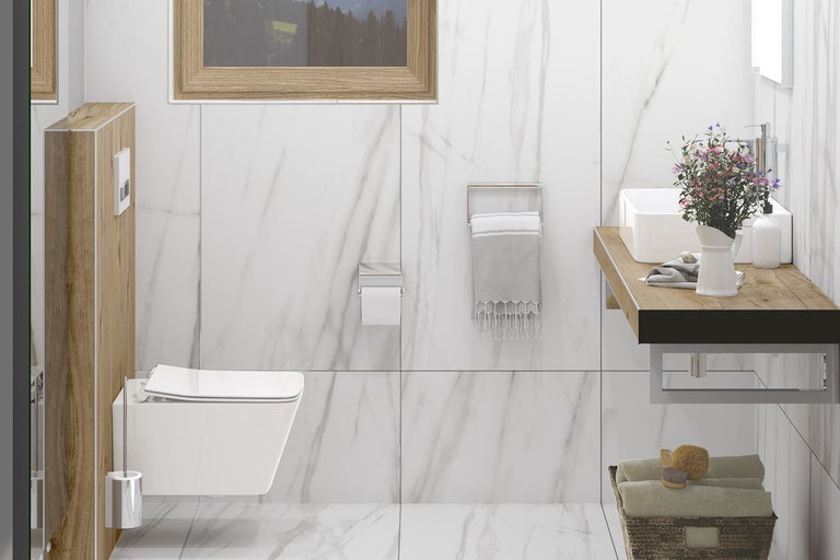 Modernt badrum med toalett, handfat och träelement