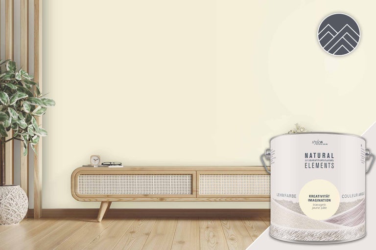 Vardagsrum med lerfärg i ljusgult och färgburk