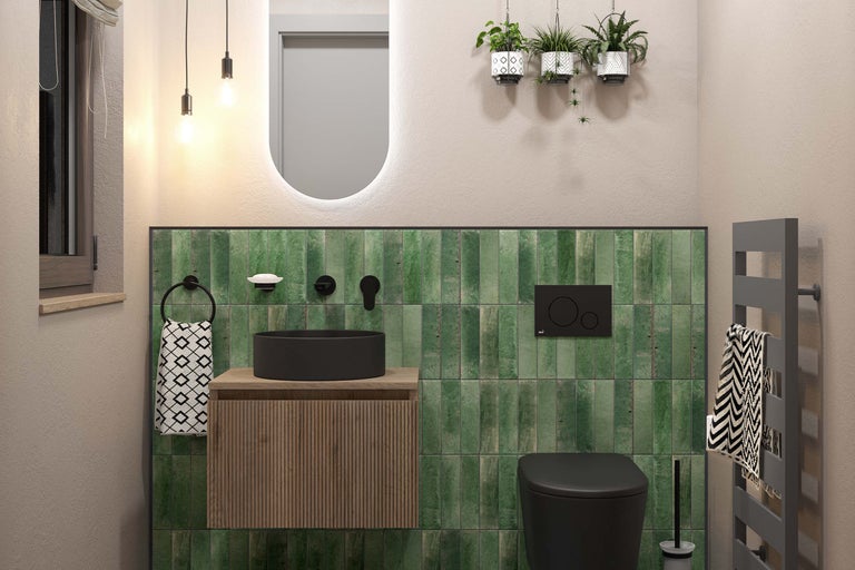 Modernt badrum med tvättställ, toalett och handdukstork