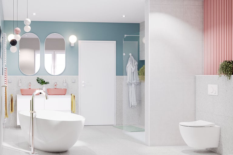 Modernt badrum med badkar, handfat och toalett