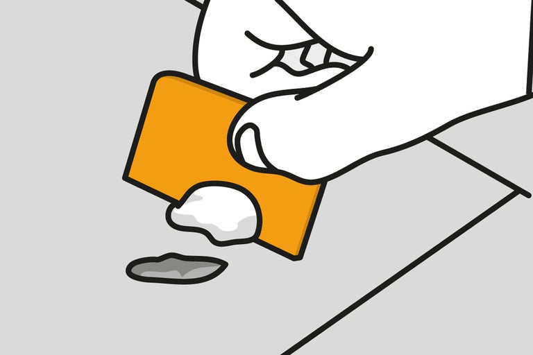 Illustration av en hand som tar bort rengöringsmedel med en spatel