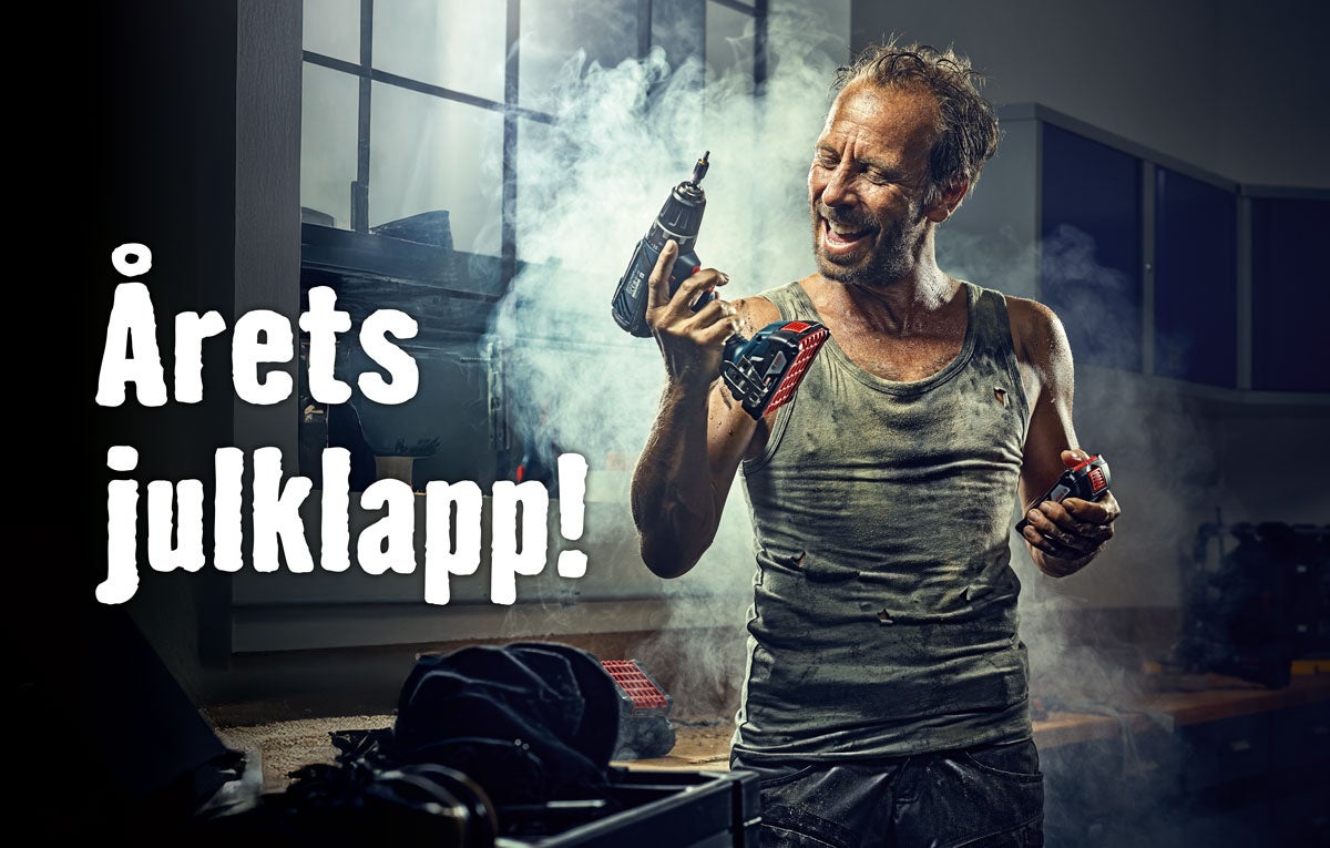 Man håller i sladdlös skruvdragare i verkstad med texten: Årets julklapp