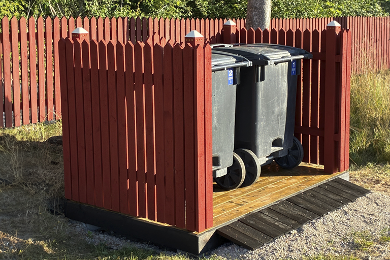 Så bygger du ett soptunneskydd