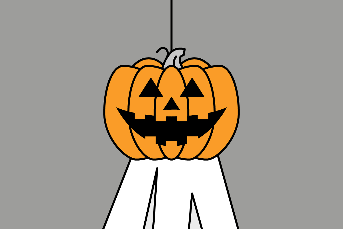 Halloweendekoration med pumpa och spöke