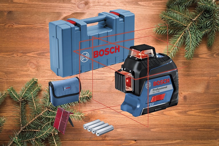 Bosch GLL 3-80 Professional linjelaser med tillbehör på träbakgrund