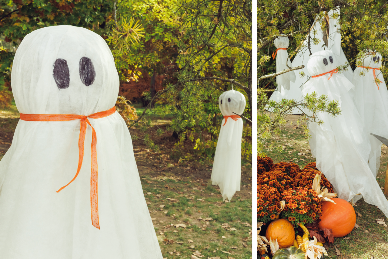 Dekorativa spökfigurer med orange band i trädgården för Halloween