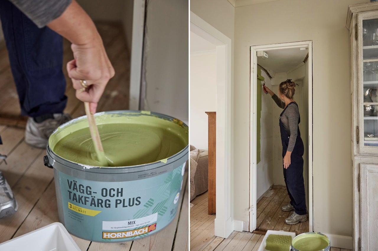 En person rör om grön vägg- och takfärg i en Hornbach-hink medan en kvinna målar en vägg med en roller.