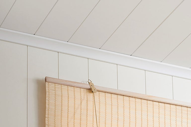 Tak med paneler och bamburullgardin