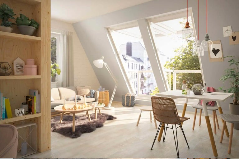 Ljust vardagsrum med takfönster, hylla, soffa, bord och stolar
