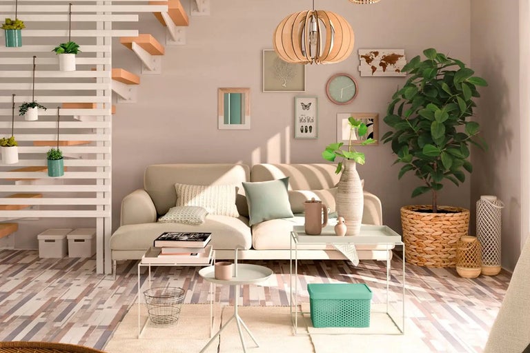 Vardagsrum med soffa, växter, dekoration och trappa