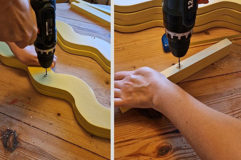 Bild av en sladdlös skruvdragare som skruvar en skruv i en gul träbit på en träyta
