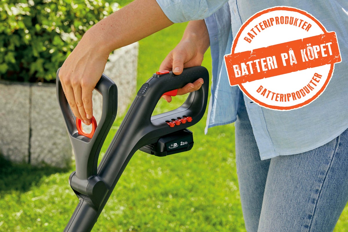 Batteridrivet trädgårdsredskap som används med information om kampanjen batteri på köpet.