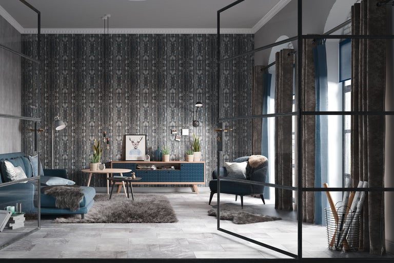 Vardagsrum med soffa, fåtölj, byrå, bord och dekorativ väggdesign för en stilfull atmosfär