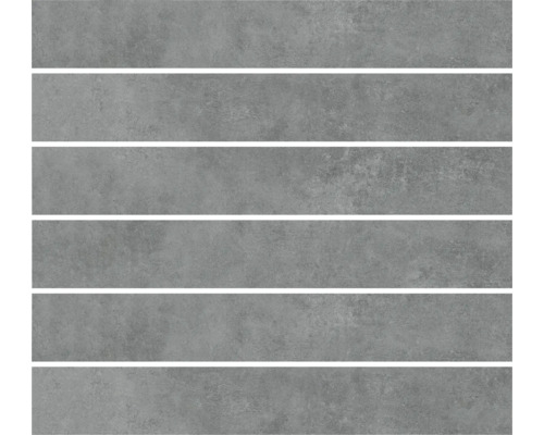 Flera grå keramiska väggplattor med betongutseende