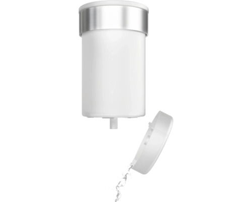 Tvåldispenser med öppet lock och flytande tvål som rinner ut