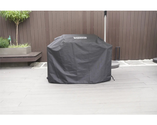 Tenneker grill med skyddshuva utomhus