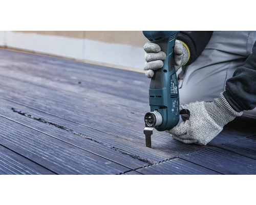 Oscillerande elverktyg som används på trädäck