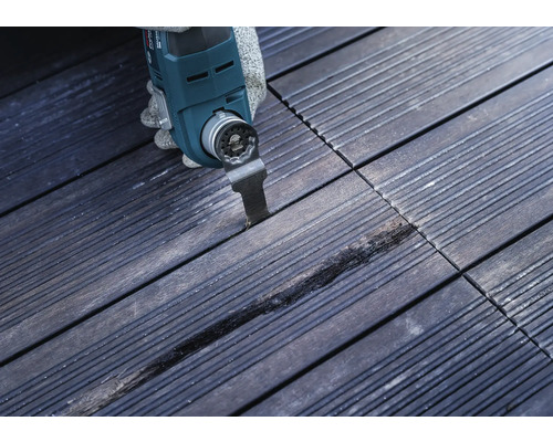 Multifunktionsverktyg som används på träplattor