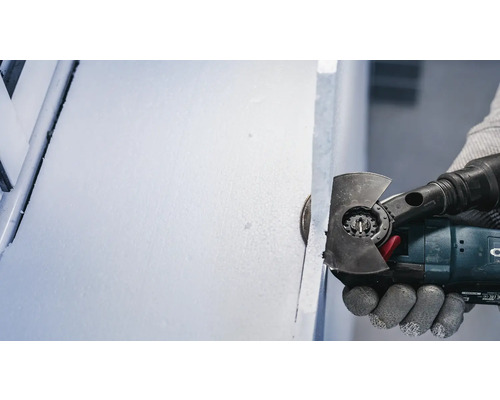 Multiverktyg som används för att skära isoleringsskivor