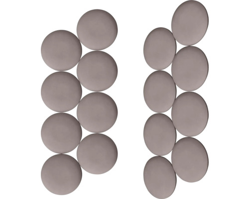 Två rader runda keramiska mosaikplattor.