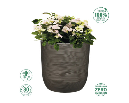 Blomkruka med växt och symbolerna: återvinningsbar, temperaturbeständig, 30 års erfarenhet och nollutsläppsmål