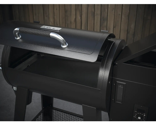 Tenneker kolgrill med delvis öppet lock