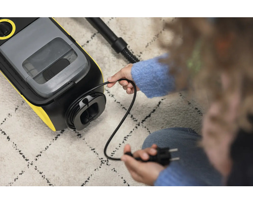 Kabelfack på en rengöringsextraktor med kontakt