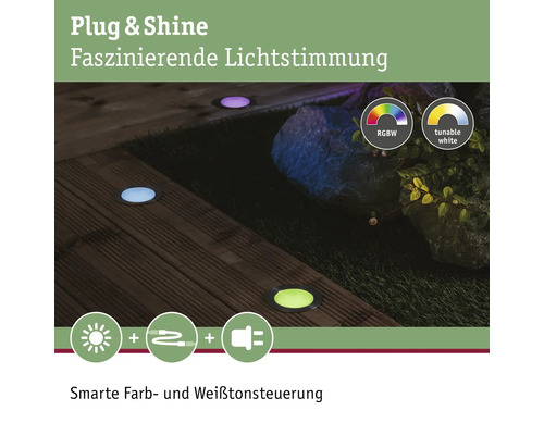 Markspottar med olika färger för trädgårdsbelysning.