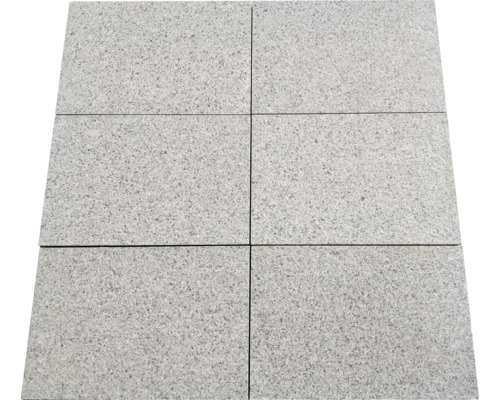 Sex gråa stenplattor för utomhusbruk