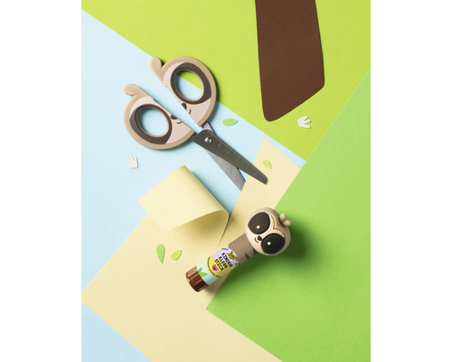 Barnsax och limstift med sengångarmotiv på färgat papper