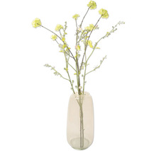 Dekorativa konstgjorda blommor i en vas