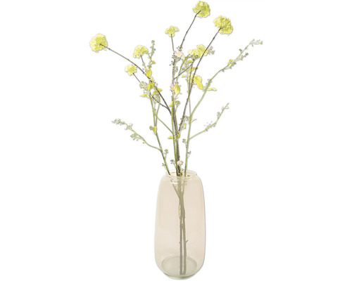Dekorativa konstgjorda blommor i en vas