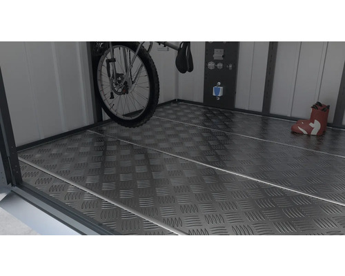 Insidan av en förvaringslåda med aluminiumgolv, cykel och stövel