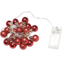 Dekorativ ljusslinga med röda julgranskulor och batterifack