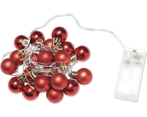 Dekorativ ljusslinga med röda julgranskulor och batterifack