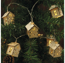 Ljusslinga med husmotiv på en julgran