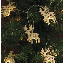 Ljusslinga med renar i trä i julgranen