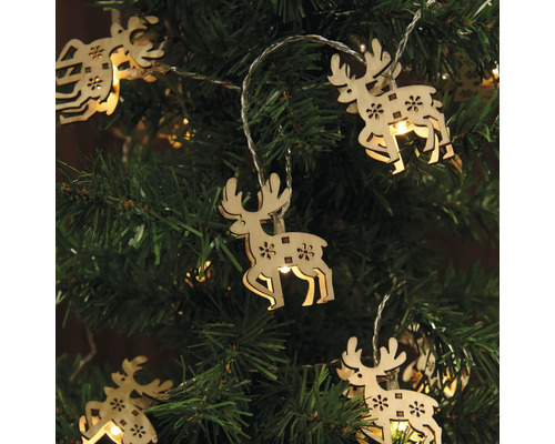 Ljusslinga med renar i trä i julgranen